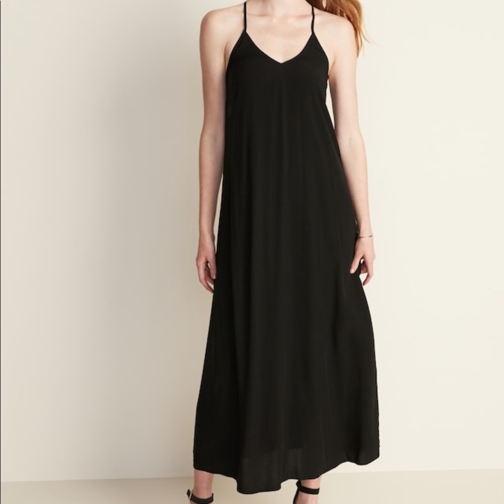 Sleeveless black swing dress